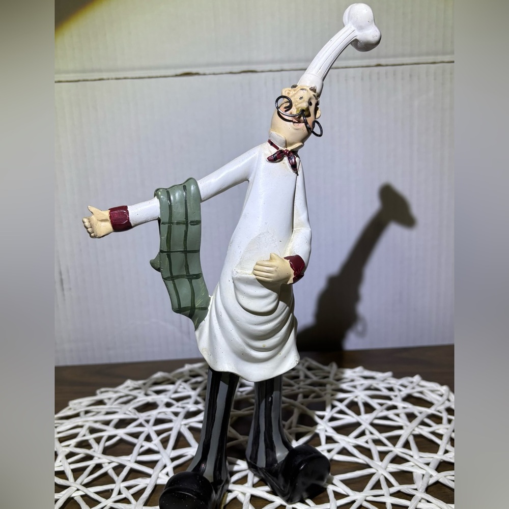 Italian maitre figurine ready to show you a table & boss the wait staff …